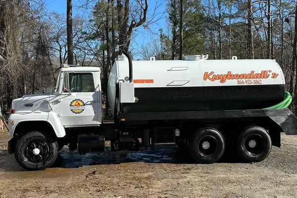 Excavation machine and crew on location